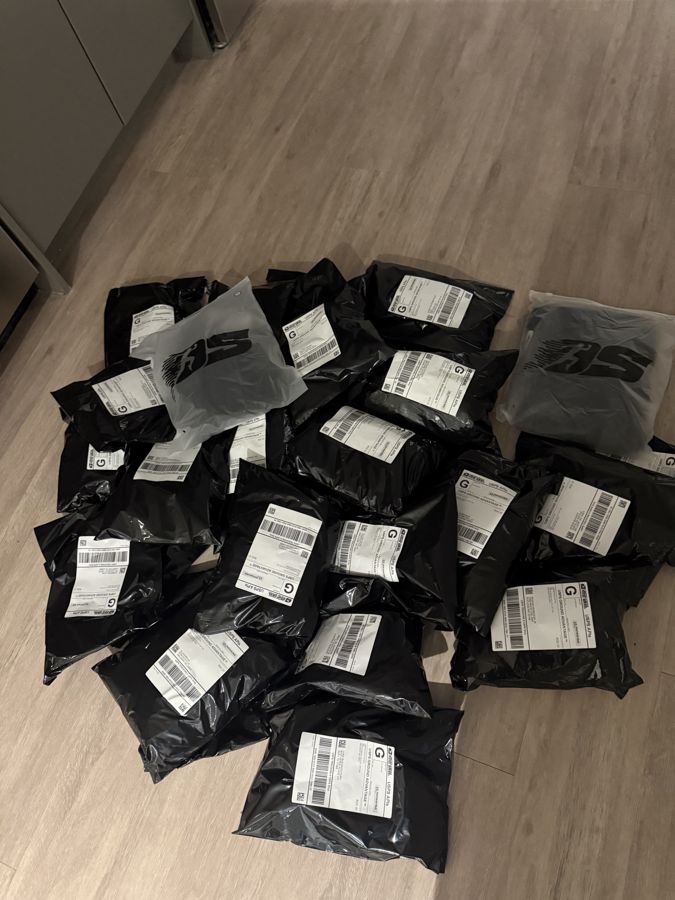 A pile of packed OS orders ready to ship
