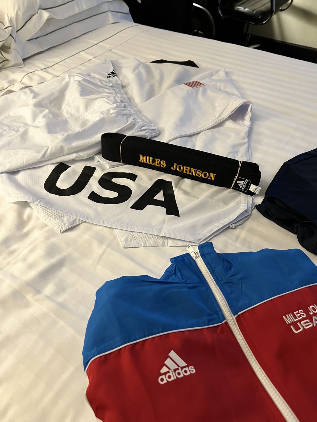 Team USA uniform and black belt embroidered with Miles Johnson